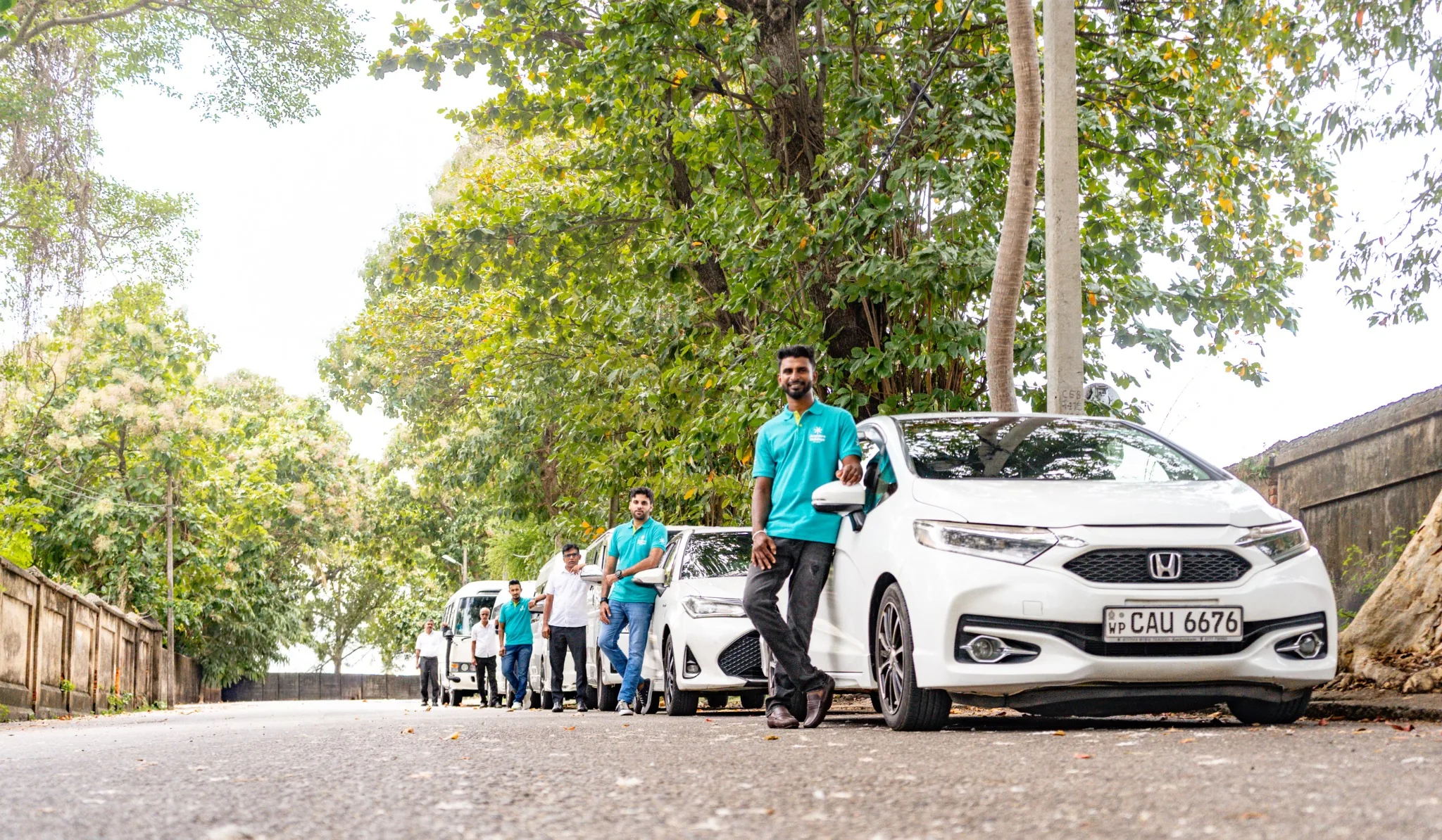 Arabiers chauffeur guides with Sri Lanka tour vehicles for round tours